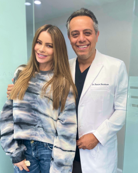 Dr. Sharyar Baradaran with patient. Beverly Hills periodontal practice.